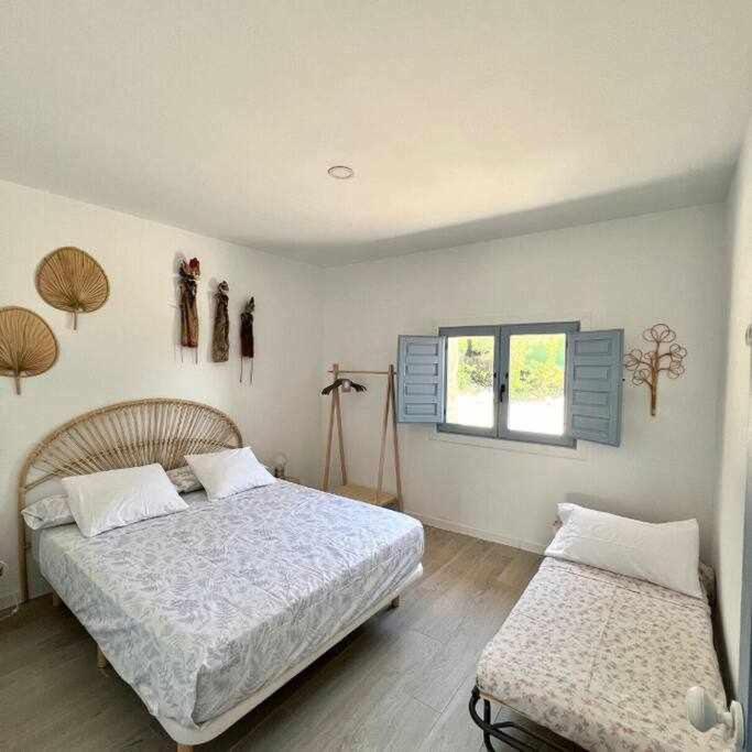 Postel nebo postele na pokoji v ubytování Casa rural La Casona de Monterrey