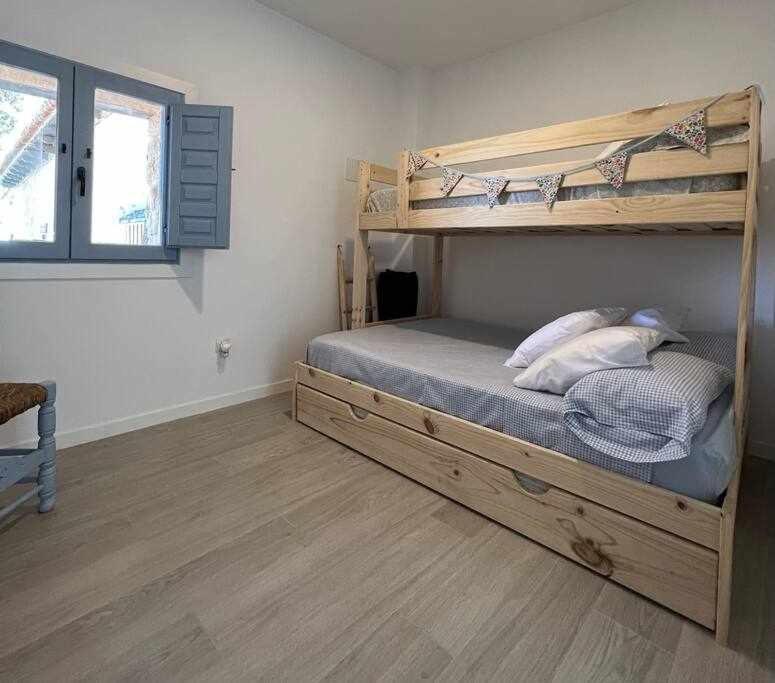 Postel nebo postele na pokoji v ubytování Casa rural La Casona de Monterrey