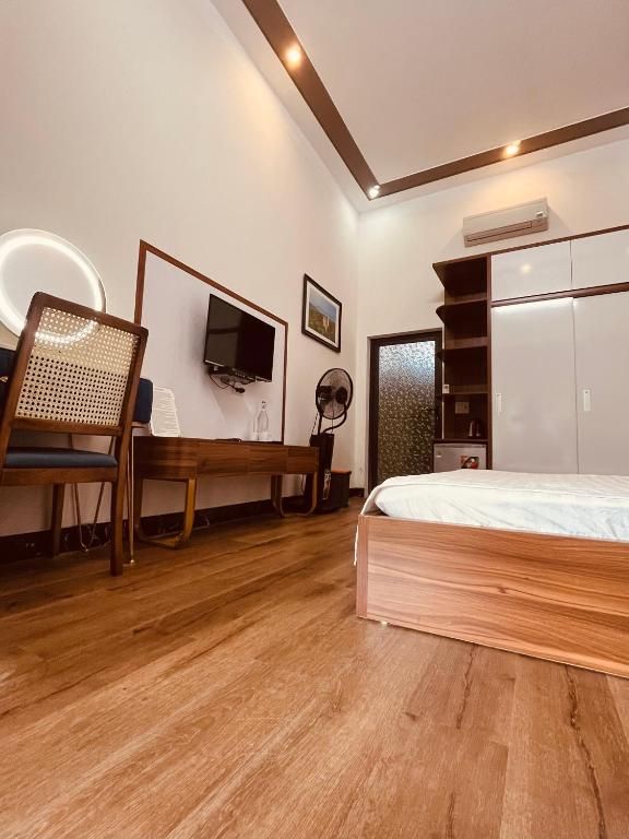 TV a/nebo společenská místnost v ubytování Coto Center Homestay