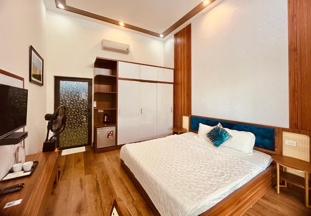 Postel nebo postele na pokoji v ubytování Coto Center Homestay