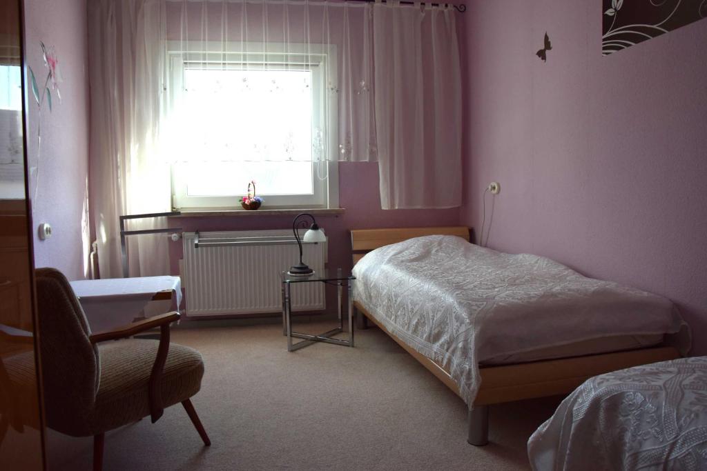 Postel nebo postele na pokoji v ubytování Ferienwohnung "Unger"