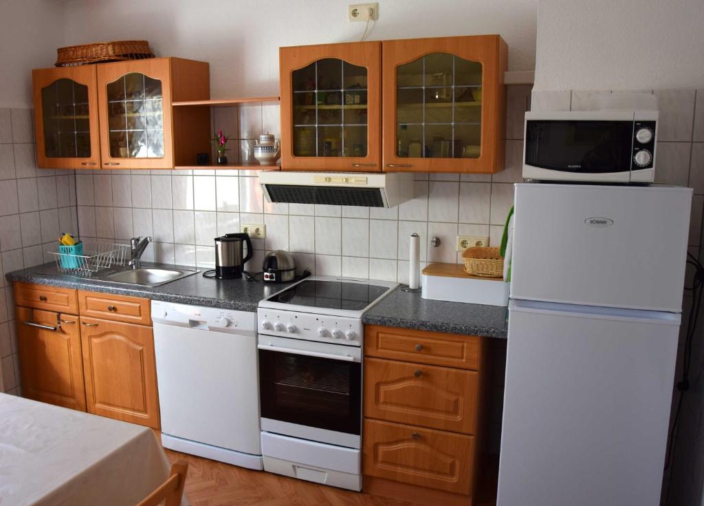 Kuchyň nebo kuchyňský kout v ubytování Ferienwohnung "Unger"
