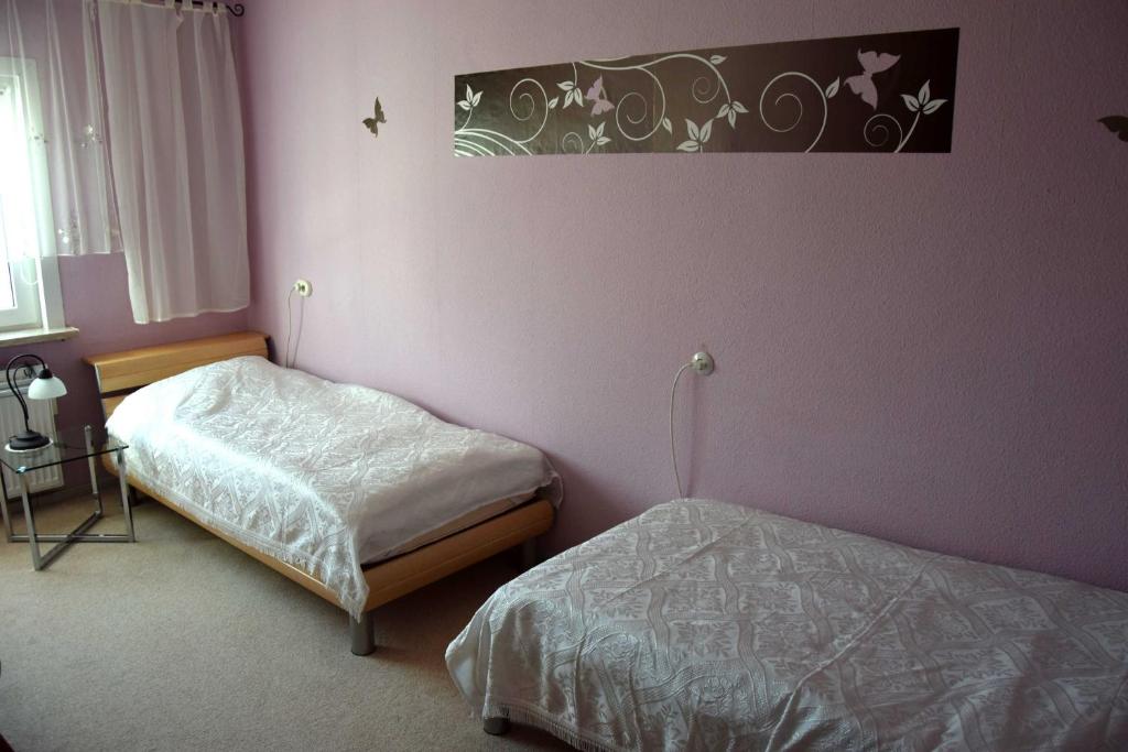 Postel nebo postele na pokoji v ubytování Ferienwohnung "Unger"