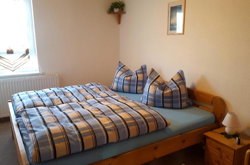 Postel nebo postele na pokoji v ubytování Ferienwohnung Nichau