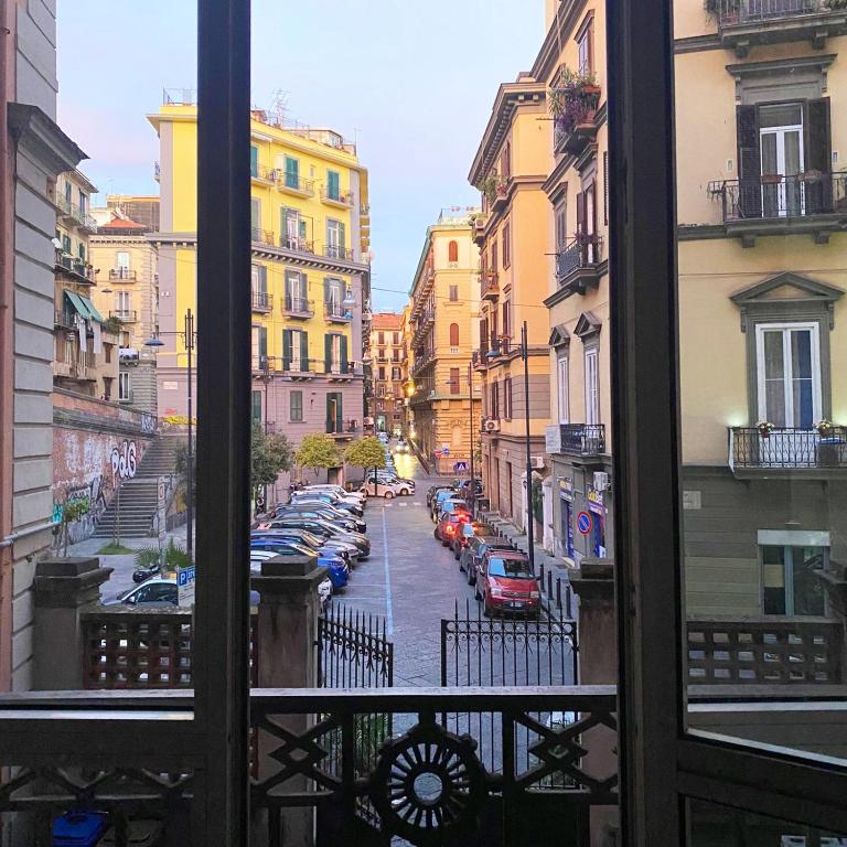 a view of a city street from a window at Salvanna Centro Storico in Naples
