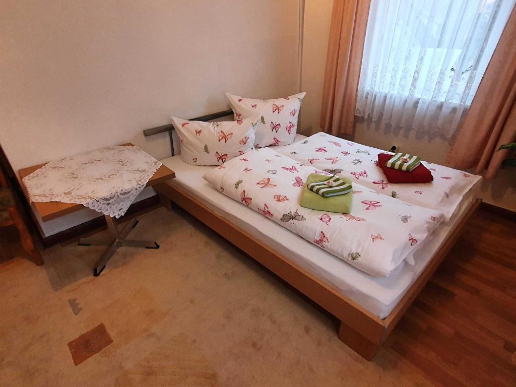 Postel nebo postele na pokoji v ubytování Ferienwohnung Walpurga