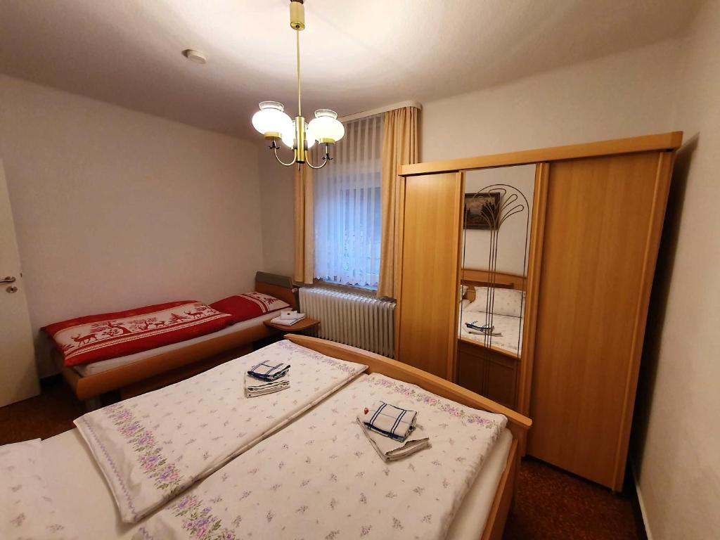 Postel nebo postele na pokoji v ubytování Ferienwohnung Walpurga