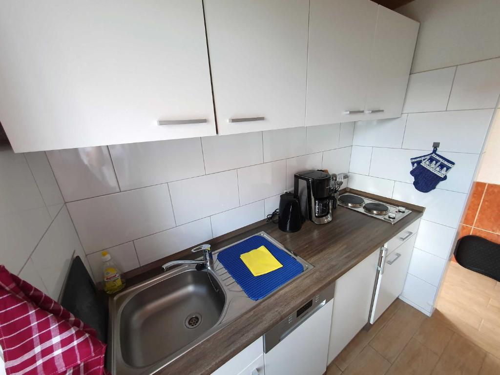 Kuchyň nebo kuchyňský kout v ubytování Ferienwohnung Schenk