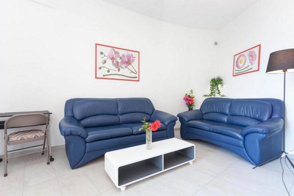Posezení v ubytování Summerheaven Apartments