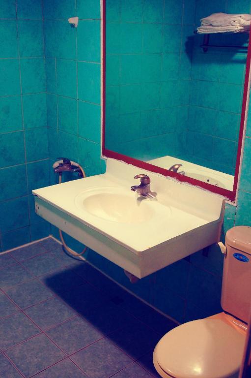 Koupelna v ubytování Li Duo Hotel