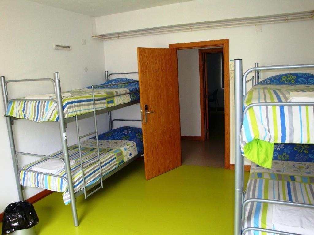 Postel nebo postele na pokoji v ubytování HI Castelo Branco - Pousada de Juventude