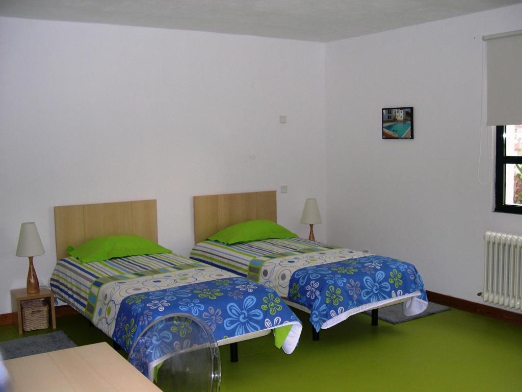 Postel nebo postele na pokoji v ubytování HI Castelo Branco - Pousada de Juventude