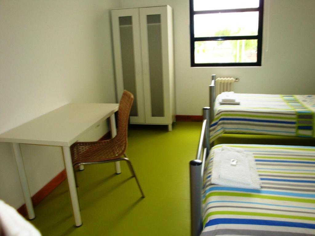 Postel nebo postele na pokoji v ubytování HI Castelo Branco - Pousada de Juventude