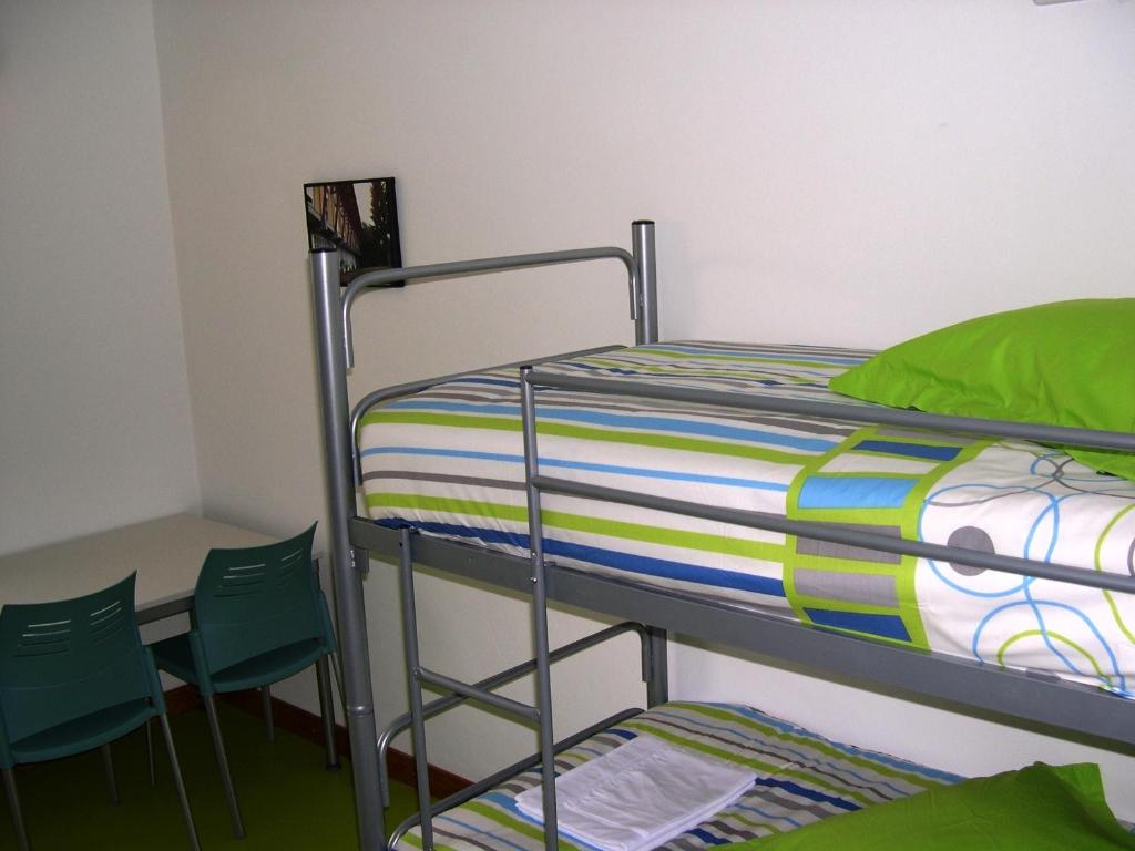 Postel nebo postele na pokoji v ubytování HI Castelo Branco - Pousada de Juventude