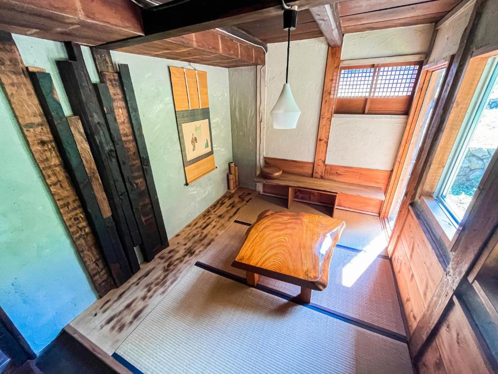 Posezení v ubytování 古民家宿Tani House Itaya -セルフチェックイン