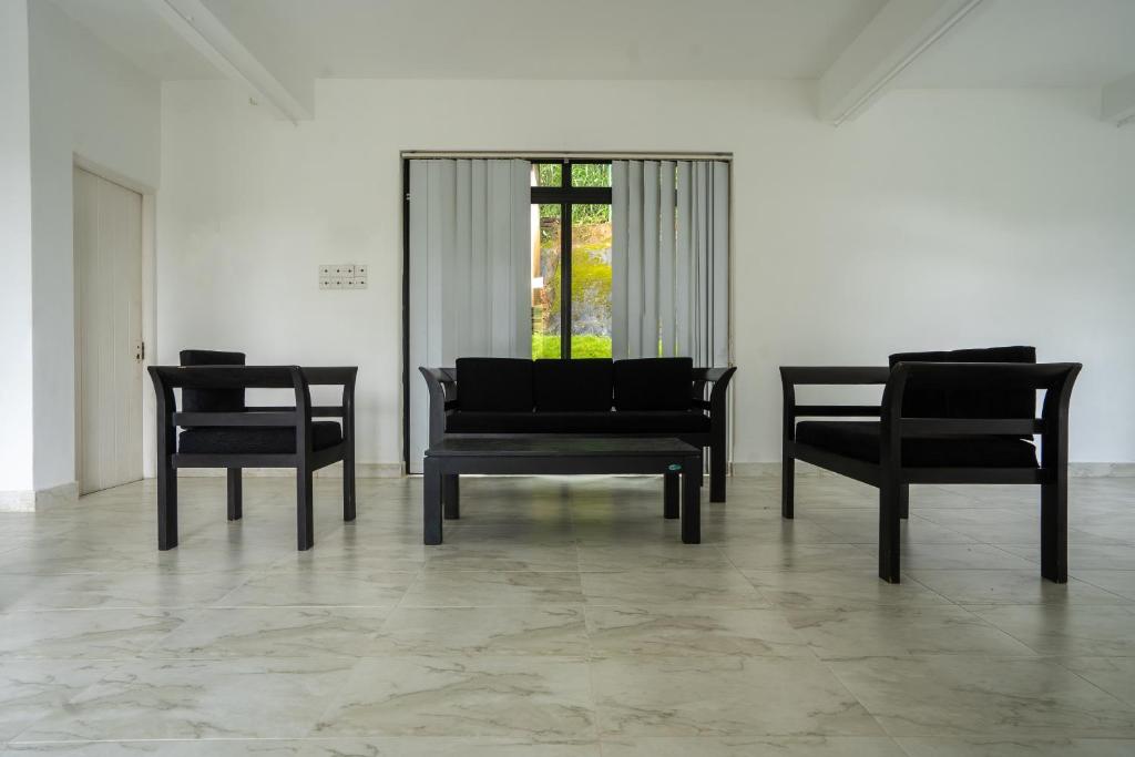 Posezení v ubytování Shiro in Kandy