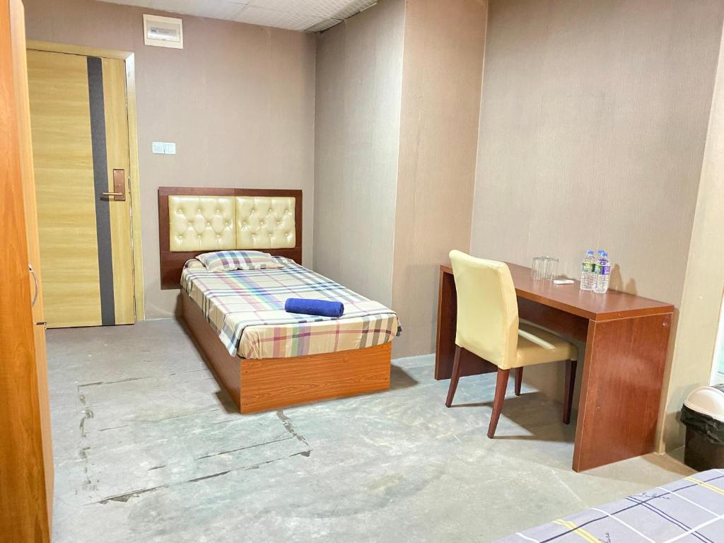 Postel nebo postele na pokoji v ubytování Sundale Hotel
