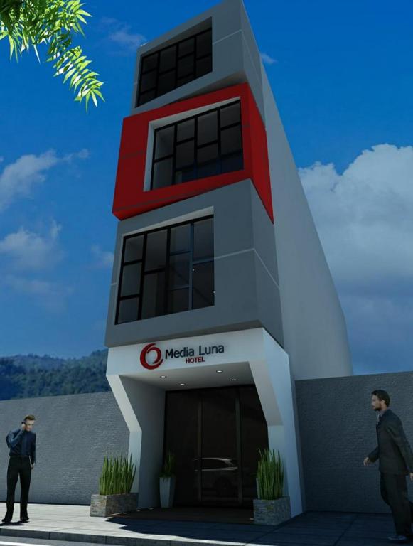 a rendering of a building with people standing outside at Hotel Media Luna Cucuta in Cúcuta