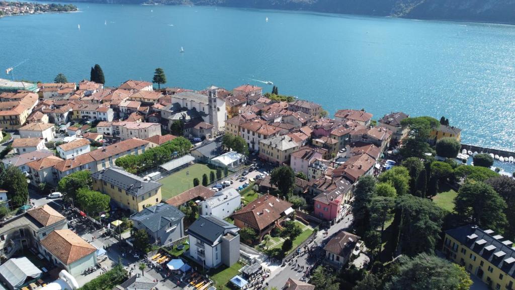 an aerial view of a town next to the water at Albergo Ristorante Grigna in Mandello del Lario