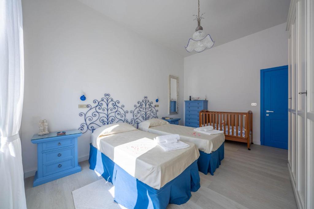 Posteľ alebo postele v izbe v ubytovaní Casa Roberta