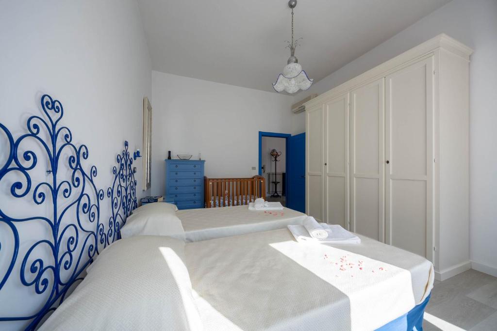 Posteľ alebo postele v izbe v ubytovaní Casa Roberta