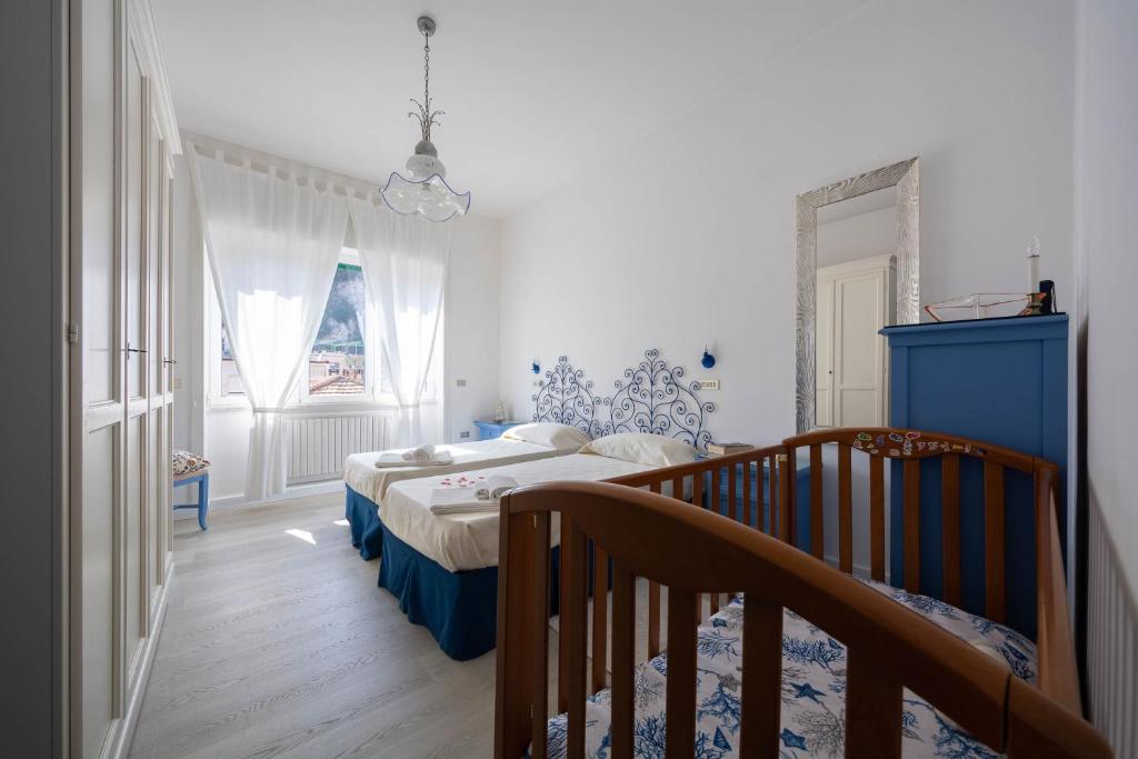 Posteľ alebo postele v izbe v ubytovaní Casa Roberta