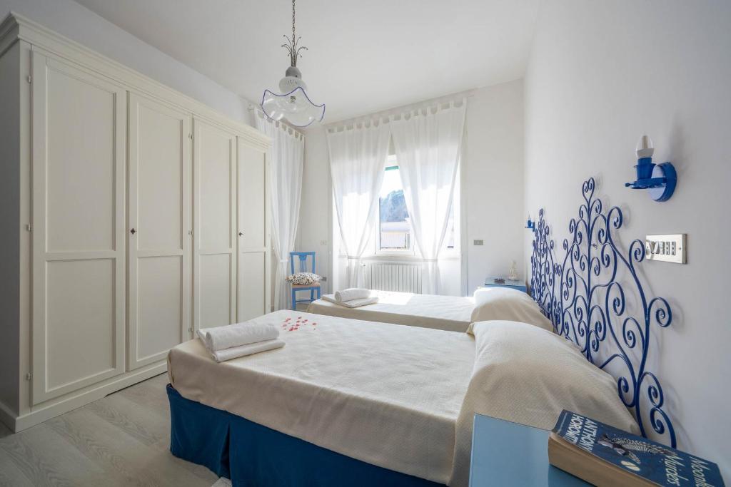 Posteľ alebo postele v izbe v ubytovaní Casa Roberta