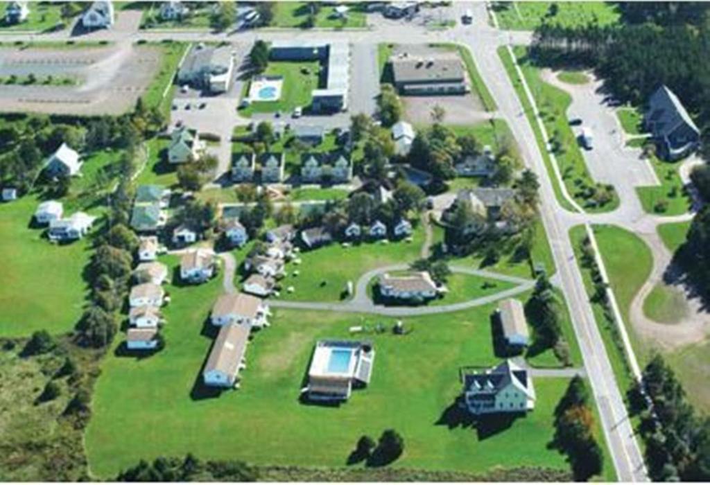 an aerial view of a park with cars and houses at Shining Waters - Ingleside Cottages in Cavendish