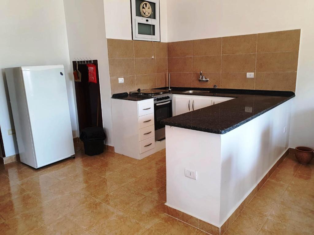 Kuchyň nebo kuchyňský kout v ubytování CASA LOKO Guest House