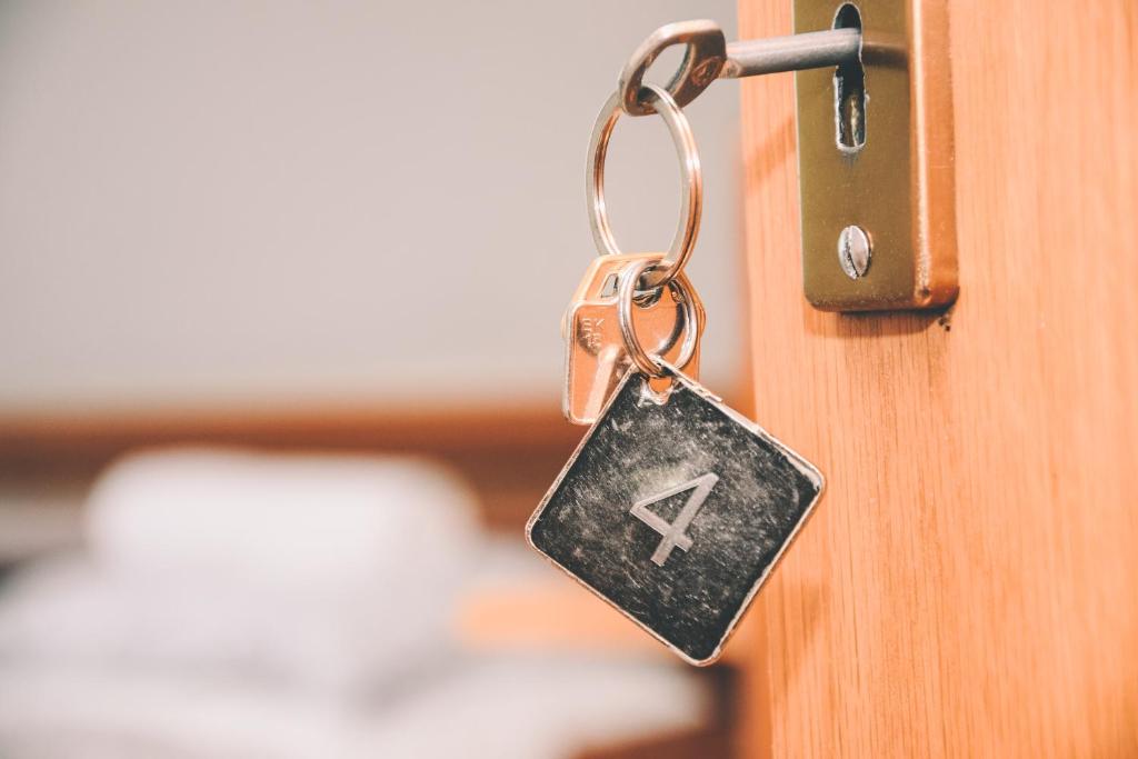 Postel nebo postele na pokoji v ubytování Pension s'Platzl Stuhleck