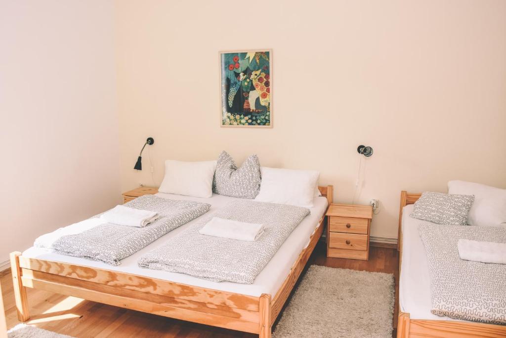 Postel nebo postele na pokoji v ubytování Pension s'Platzl Stuhleck