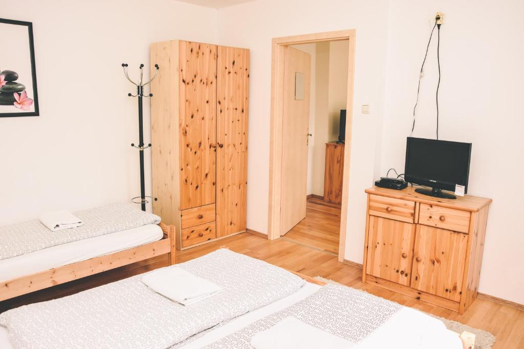 Postel nebo postele na pokoji v ubytování Pension s'Platzl Stuhleck