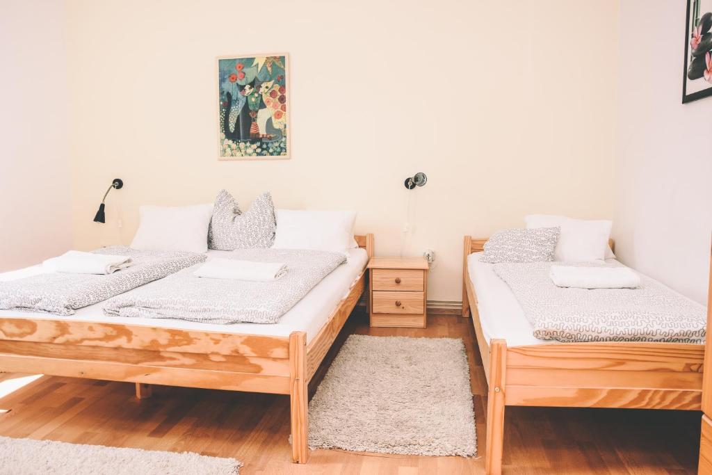 Postel nebo postele na pokoji v ubytování Pension s'Platzl Stuhleck