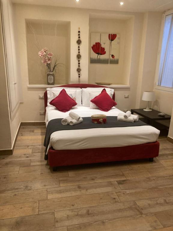 Łóżko lub łóżka w pokoju w obiekcie Borgo20 Firenze