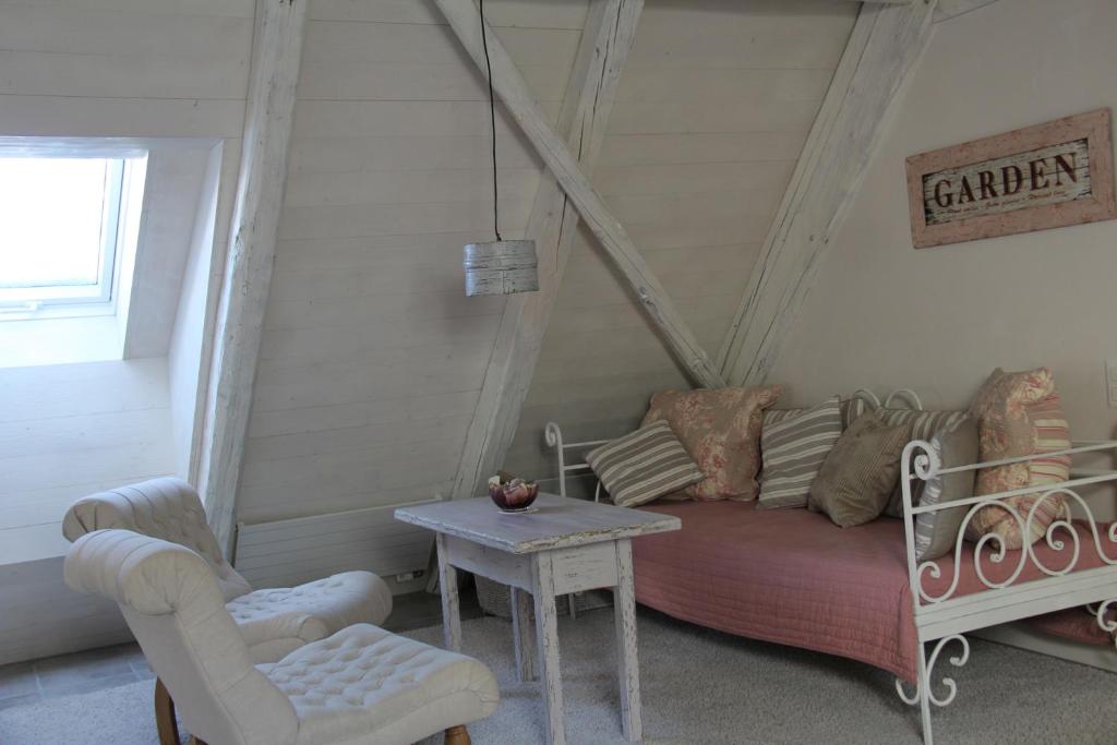 Posezení v ubytování Bed and Breakfast Gantrisch Cottage Ferienzimmer