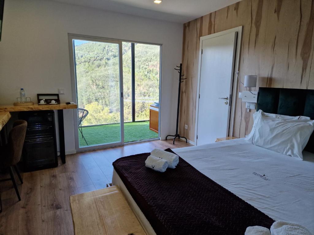 Postel nebo postele na pokoji v ubytování DOBAU village