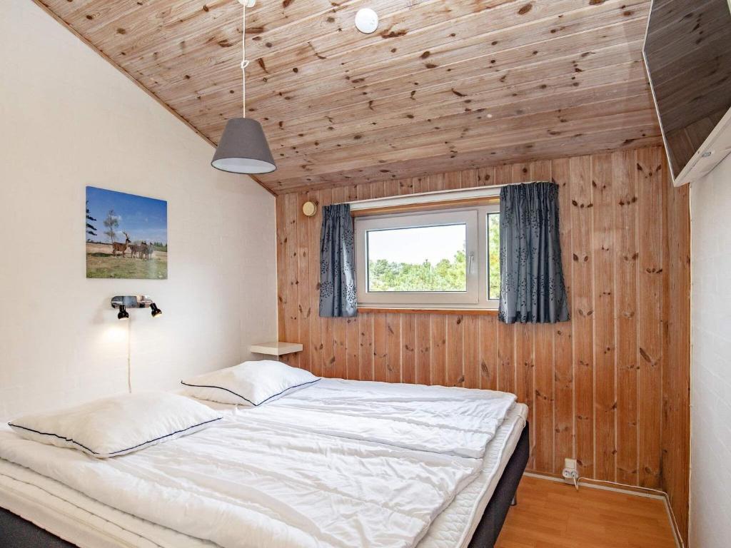 Postel nebo postele na pokoji v ubytování Luxury Retreat in Vejers - By Traum Ferienwohnungen