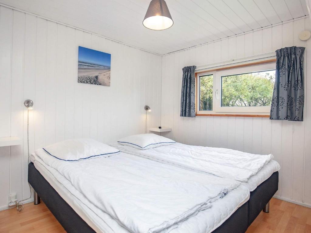 Postel nebo postele na pokoji v ubytování Luxury Retreat in Vejers - By Traum Ferienwohnungen