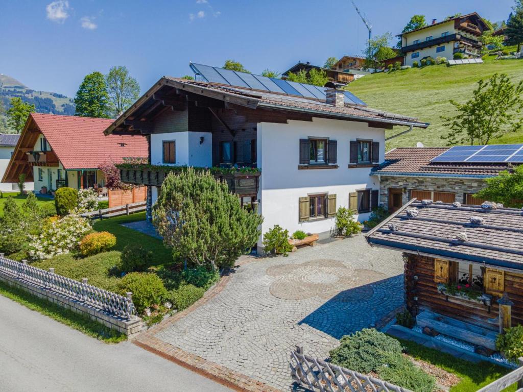 a house with solar panels on the roof at Chalet Josef in Westendorf