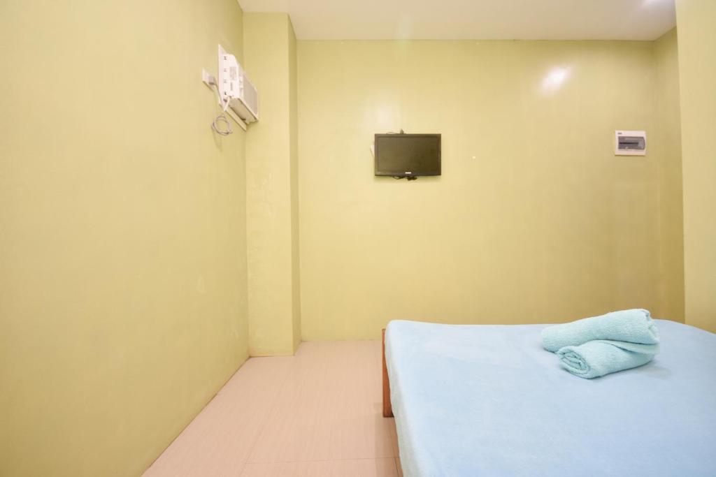 Postel nebo postele na pokoji v ubytování Boracay Backpackers