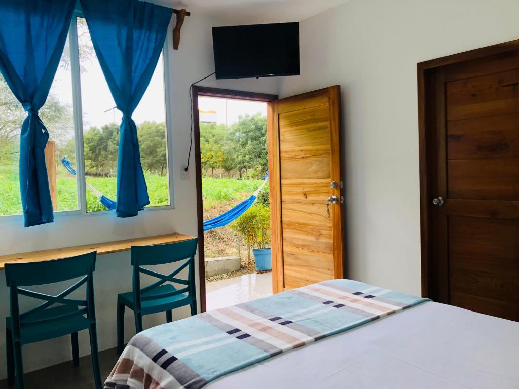 Postel nebo postele na pokoji v ubytování EL JARDIN OLON SUITES