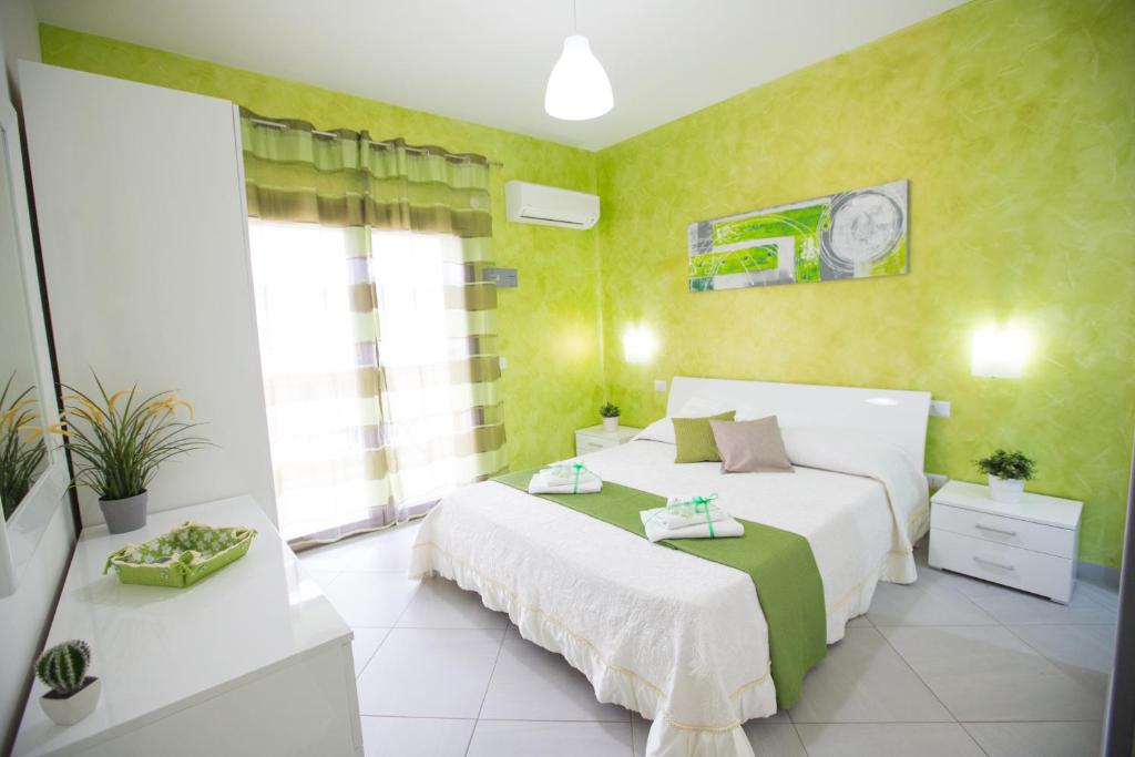 Postel nebo postele na pokoji v ubytování B&B Pepito