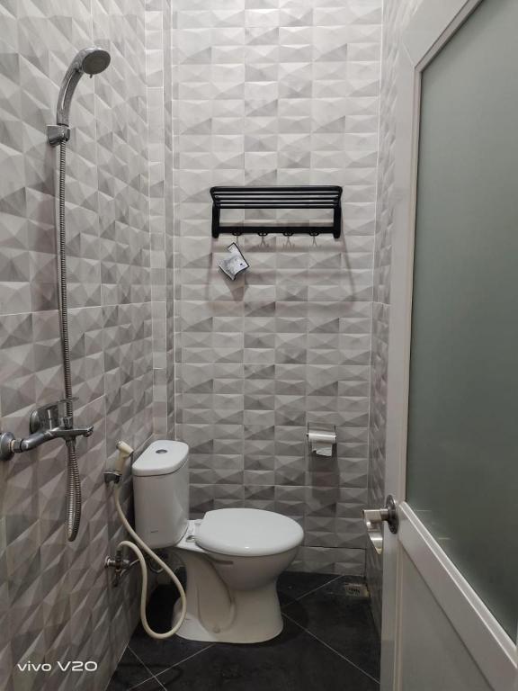 Koupelna v ubytování Bu Sepuh GuestHouse