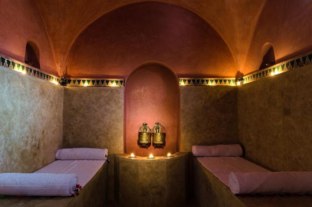 Cama o camas de una habitación en Riad Hikaya