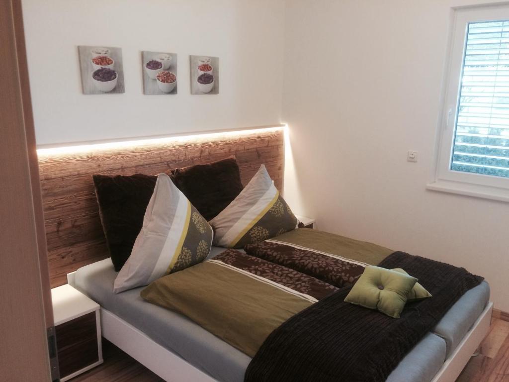 Postel nebo postele na pokoji v ubytování Apartment Mitterberger - Nassfeld
