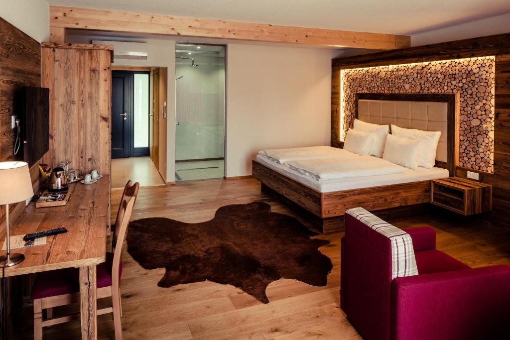 Postel nebo postele na pokoji v ubytování Villa Resort & Organic Spa - modernizace 2025