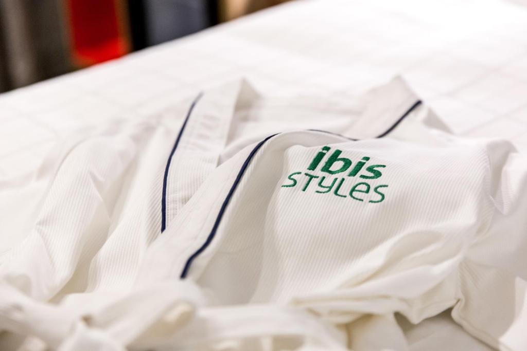 Postel nebo postele na pokoji v ubytování ibis Styles Ambassador Seoul Myeong-dong