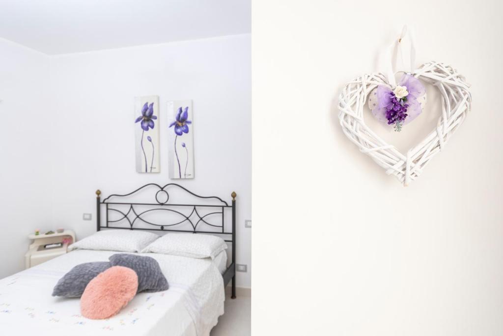 Posteľ alebo postele v izbe v ubytovaní Le Pendici Casa Vacanze