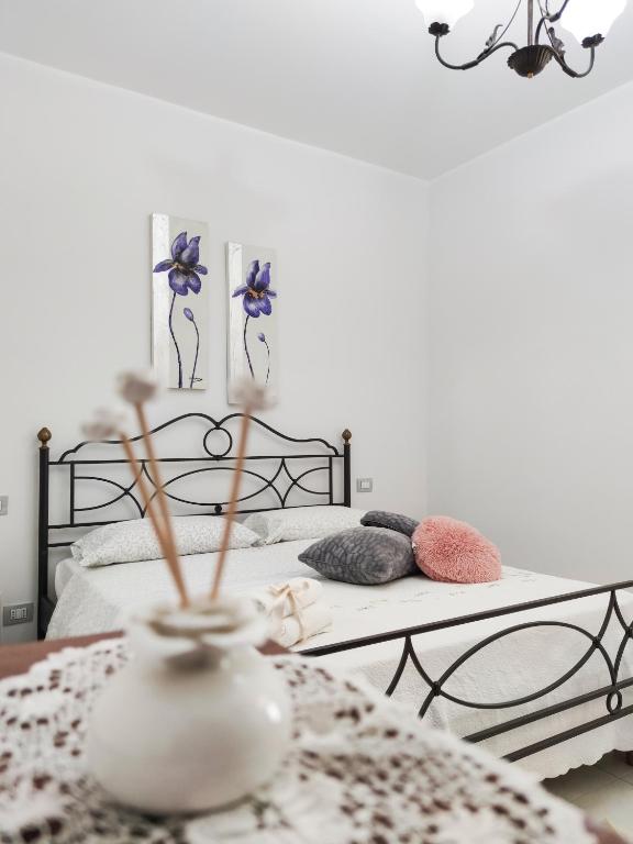 Posteľ alebo postele v izbe v ubytovaní Le Pendici Casa Vacanze