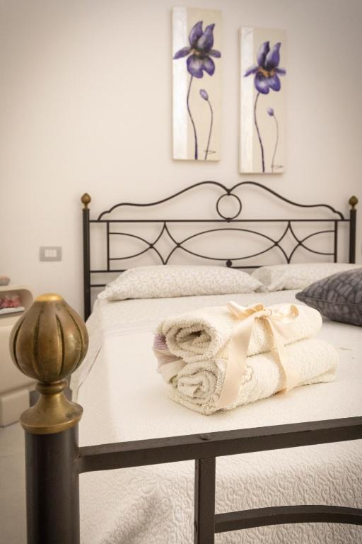 Posteľ alebo postele v izbe v ubytovaní Le Pendici Casa Vacanze